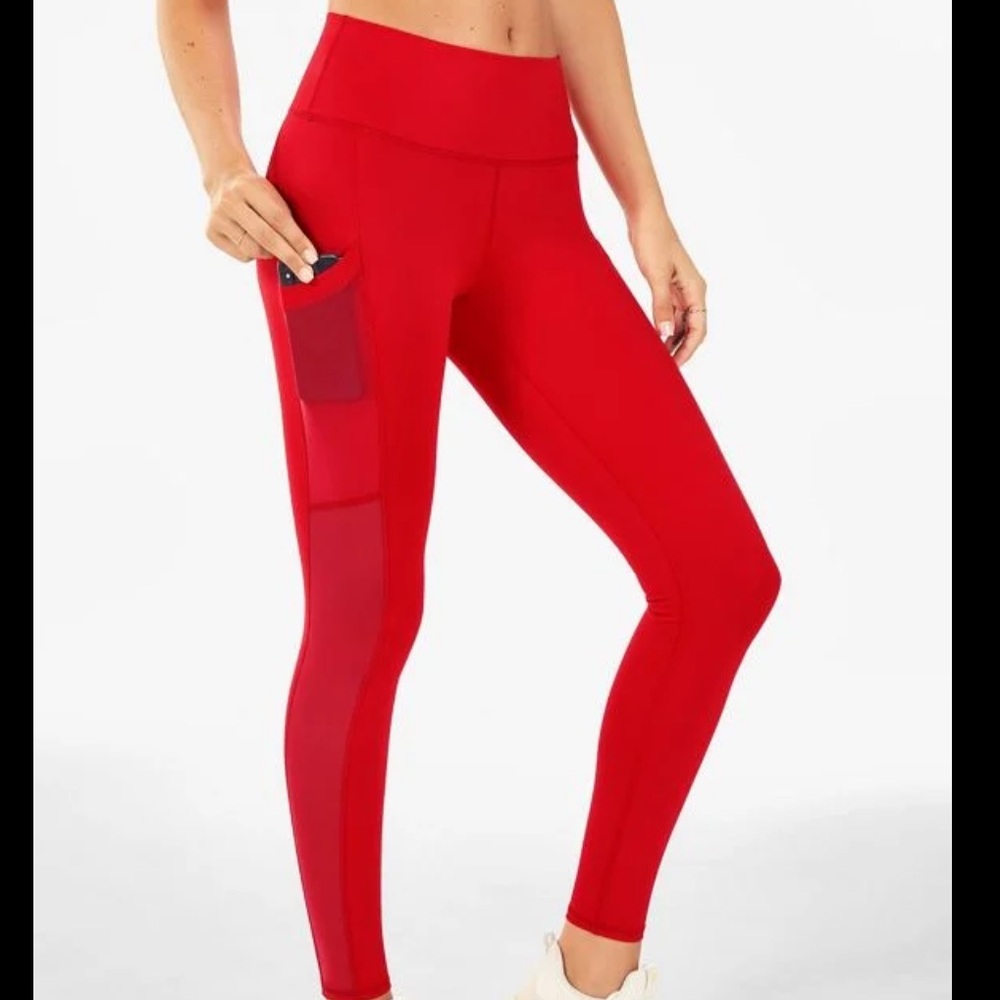 Fabletics On The Go PowerHold High-Waisted Pocket Mesh Panel Red Leggings